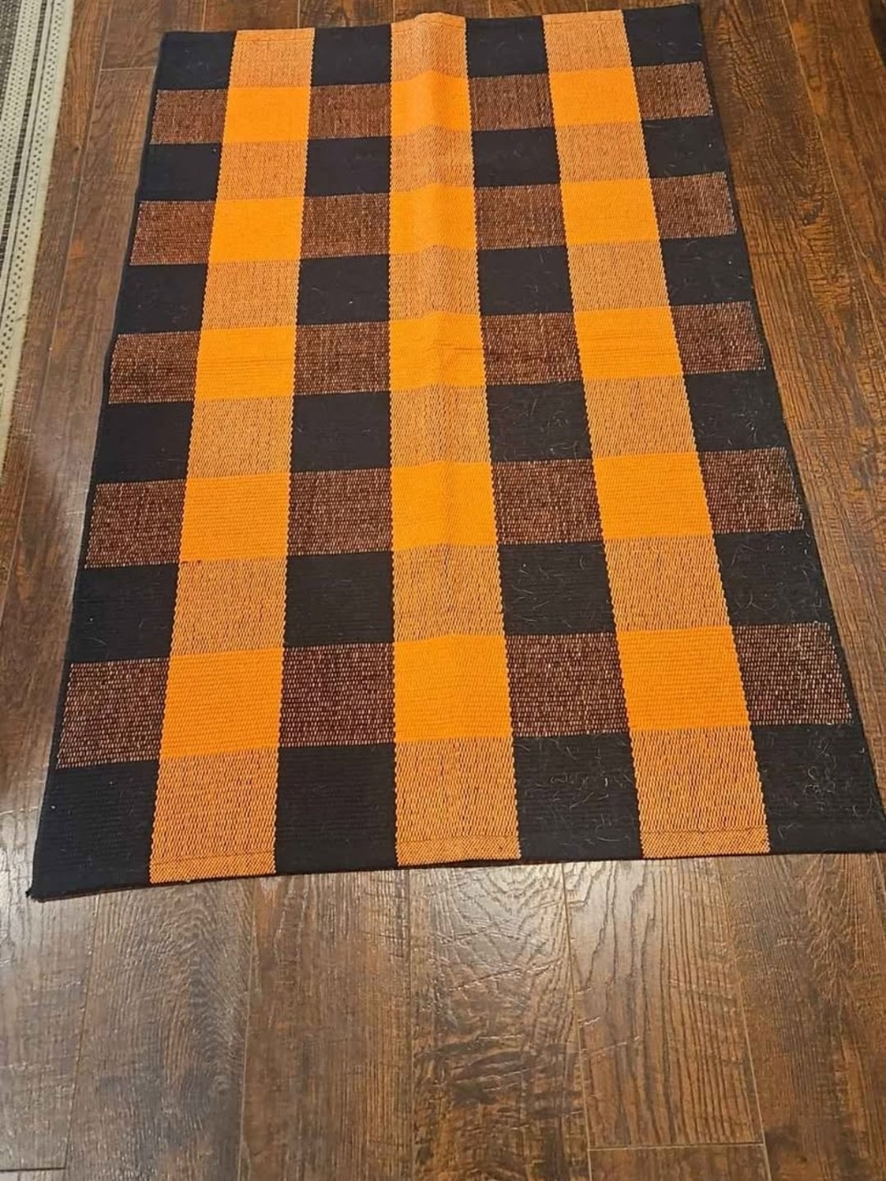 Orange and Black Checkered Accent Rug - Home Accents